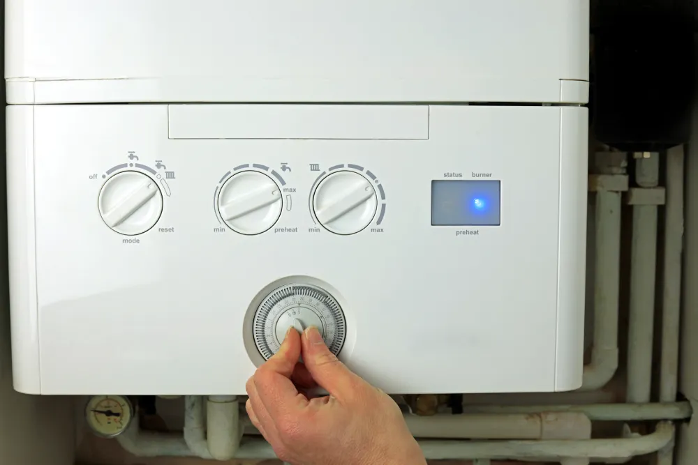 Perfect Timing Heating & Cooling providing professional boiler repair services on a residential boiler system to restore efficient and reliable heating